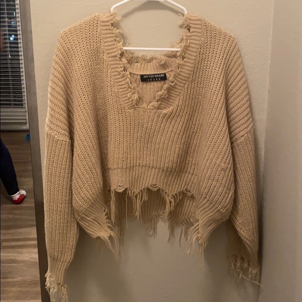 Frayed sweater